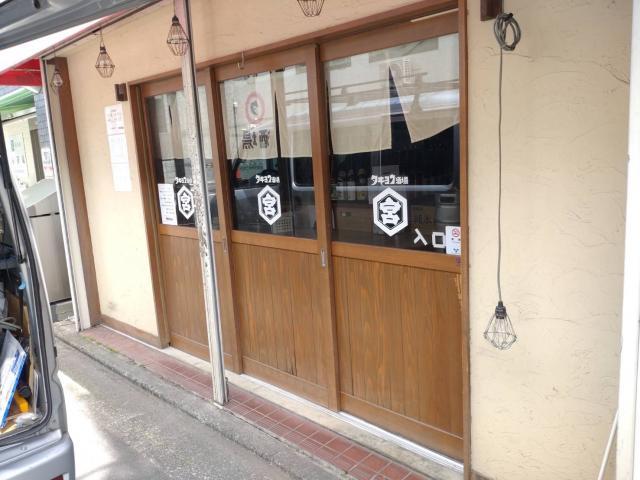 品川区西小山の居酒屋さんの入り口扉の工事終了写真