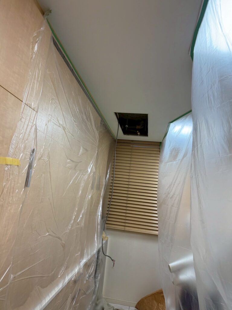 武蔵小山の歯医者さん診療室エアコンの配線調整写真